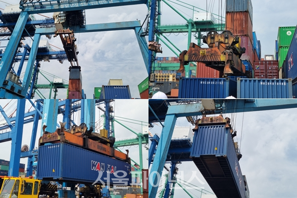 '5G 기반 크레인 원격제어'를 통해 컨테이너를 옮기는 모습. (사진=이호정 기자)