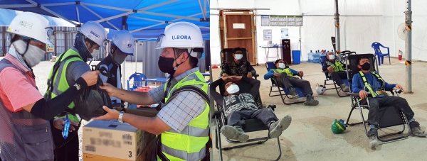 반도건설 현장소장과 직원들이 무더위에 지친 근로자들에게 아이스크림과 얼음물을 나눠주고 있다 (사진=반도건설)