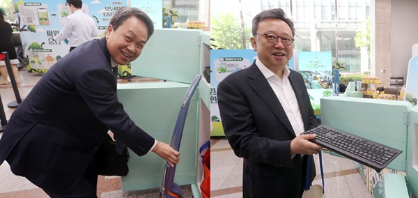 진옥동 신한금융그룹 회장(왼쪽)과 정상혁 신한은행장이 '자원순한 Day'를 통해 가정에서 쓰던 전기 청소기와 키보드 및 컴퓨터 주변기기를 기부하고 있다. (사진=신한금융그룹)