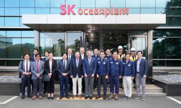 SK오션플랜트 본사를 방문한 제너럴다이내믹스와 회사 관계자들의 기념사진 (사진=SK오션플랜트)